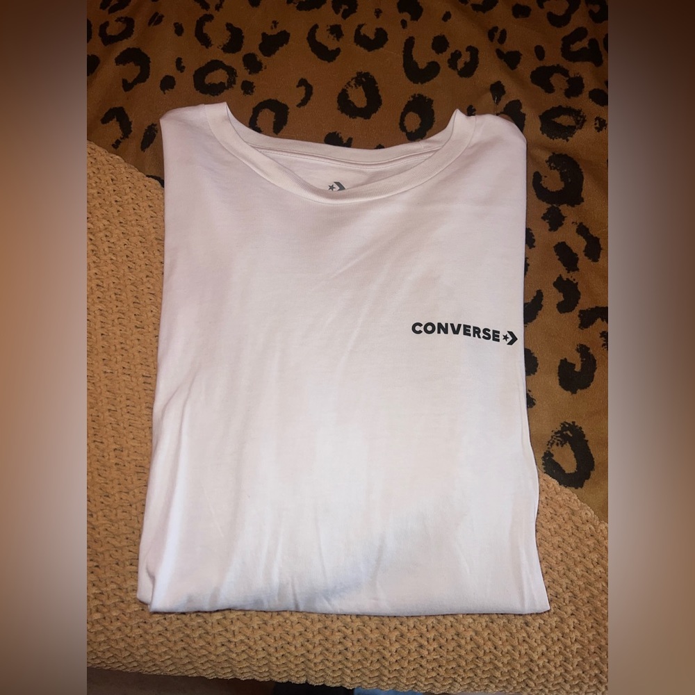 white Converse t-shirt with butterfly on the back
